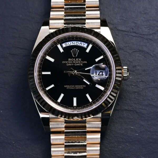 mmexport1773572574642 Rolex Day-Date 40mm 18K Yellow Gold Fluted Bezel President Bracelet Automatic Watch