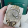 mmexport1773577101024 Rolex Day-Date 40mm 18K Yellow Gold Baguette Diamond Bezel President Bracelet Automatic Watch