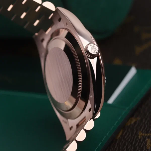 mmexport1773659453199 Rolex Day-Date 40mm 18K Everose Gold Fluted Bezel President Bracelet Automatic Watch